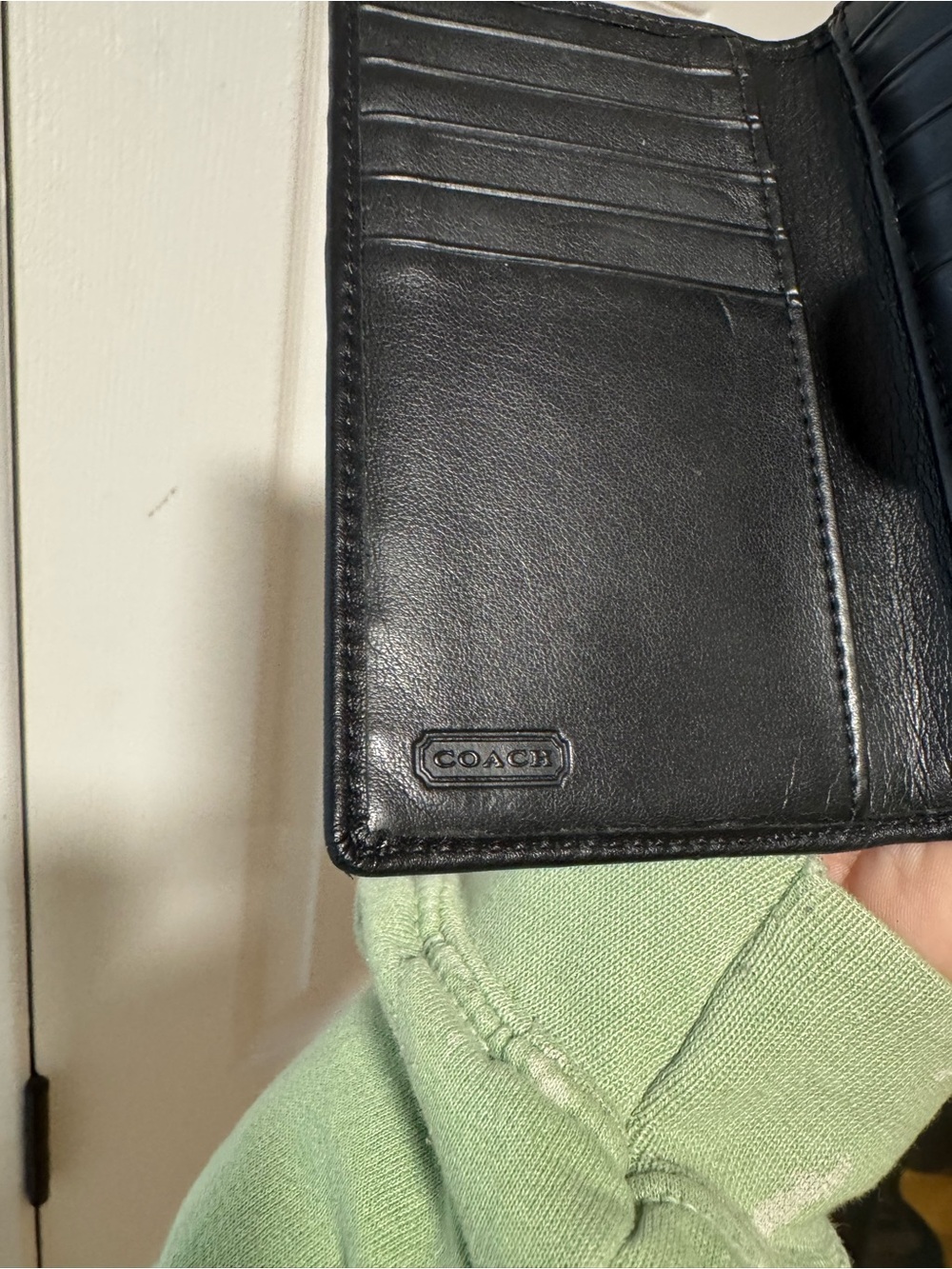 Classic Black Leather Wallet with Decorative Medallion - Picture 6 of 7